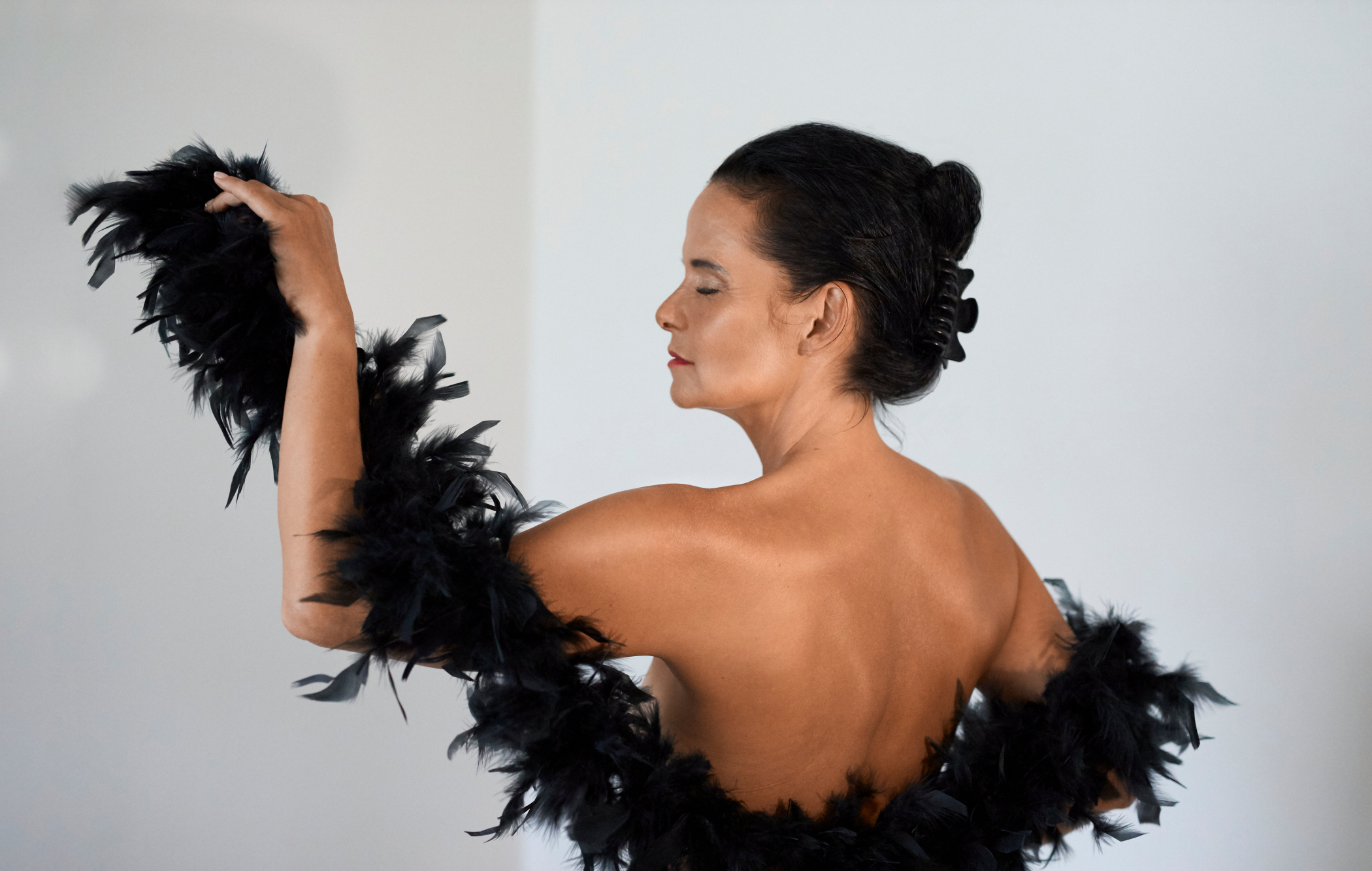 Feather boa sexy woman portrait
